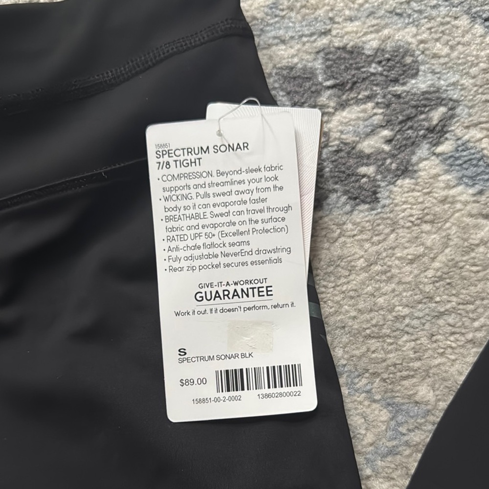 Athleta Black Performance Leggings with Reflective Details